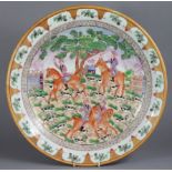 A Samson-type porcelain charger decorated with a European hunting scene in the 18th century