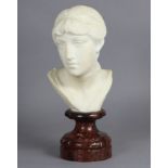 E. ROSSI, a sculptured white marble bust of a young woman, signed to reverse, on rouge marble
