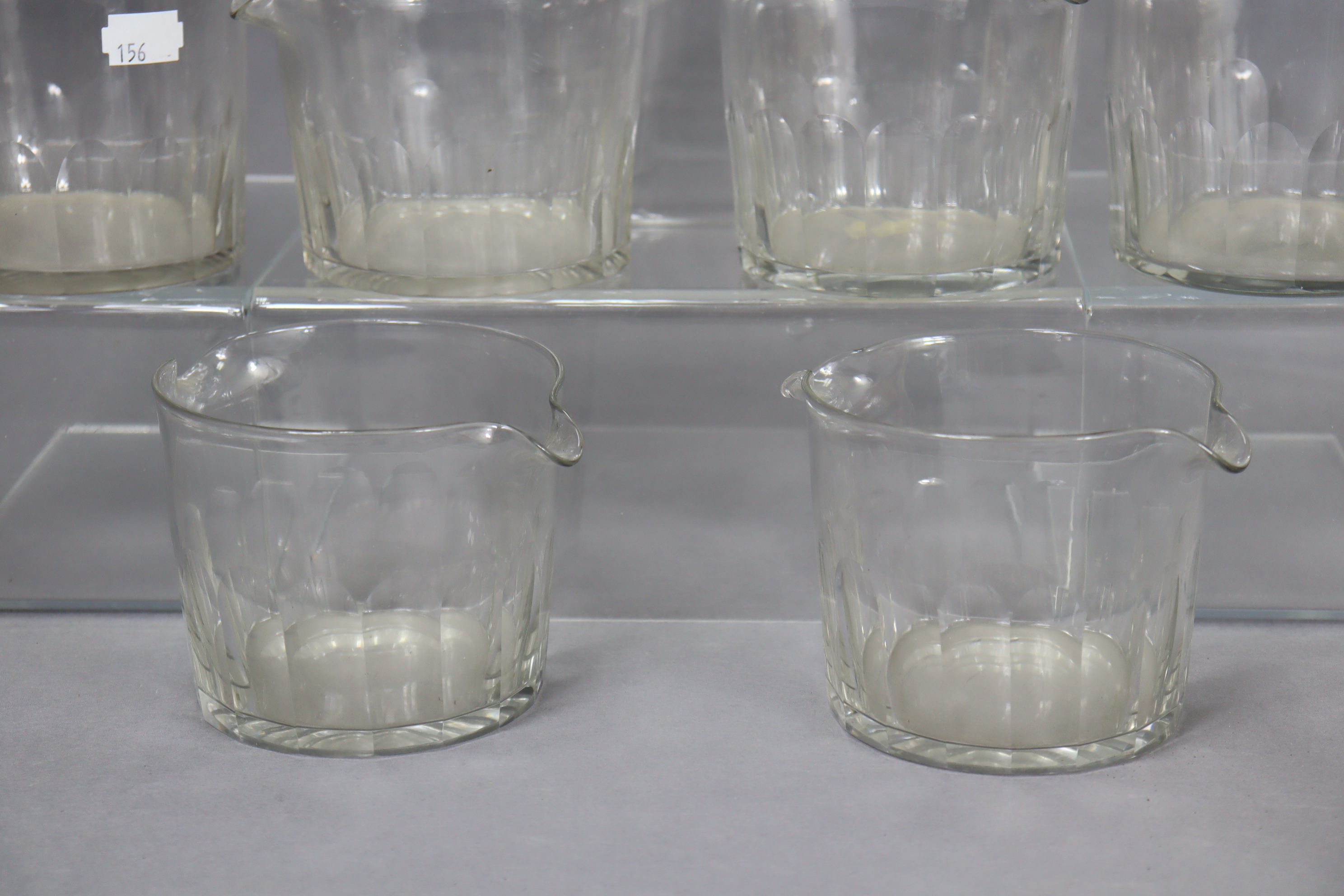 A set of eight clear cut-glass double-lipped wine glass coolers. - Image 2 of 2