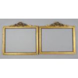 A pair of Victorian giltwood & gesso rectangular picture frames with beaded borders & ribbon-bow