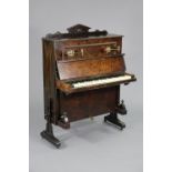 A Victorian grained pine up-right ship’s piano of small proportions, with decorative mouldings &