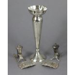 A silver posy vase of slender tapered form, on round turned foot with engraved inscription, 7½”,