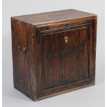 A Chinese camphor wood box with brass side handles, fitted with a single shelf enclosed by a fall-