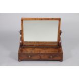 An early Victorian mahogany rectangular swing toilet mirror on carved supports & rectangular box