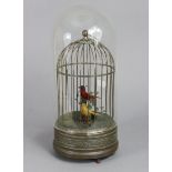 A 20th century birdcage automaton featuring two songbirds amongst foliage, each singing in turn,