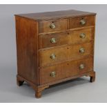 A Georgian mahogany chest with moulded edge to the plain rectangular top, fitted two short & three