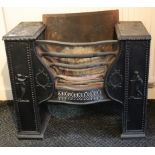 A Victorian cast-iron fire grate of rectangular form with serpentine front & pair of hob stands,
