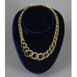 An 18ct (750) Italian gold necklace of interlinked circles (34.1g).