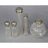A spherical glass scent bottle with silver cover (marks rubbed), and four other similar glass