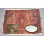 A modern Indian rug, 71” x 47½”; together with an oval wall mirror; & six decorative pictures.