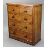 A Victorian mahogany small chest fitted two short & three long graduated drawers with turned knob