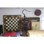 A Crawford & Black “combined Easel Desk”, boxed; a Chinese-style bird cage; two decorative pictures;