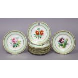 A set of twelve china dessert plates each with a pale green & gold border & having a different