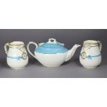 A pair of early 20th century Minton porcelain cream jugs with gilt & turquoise-band decoration &