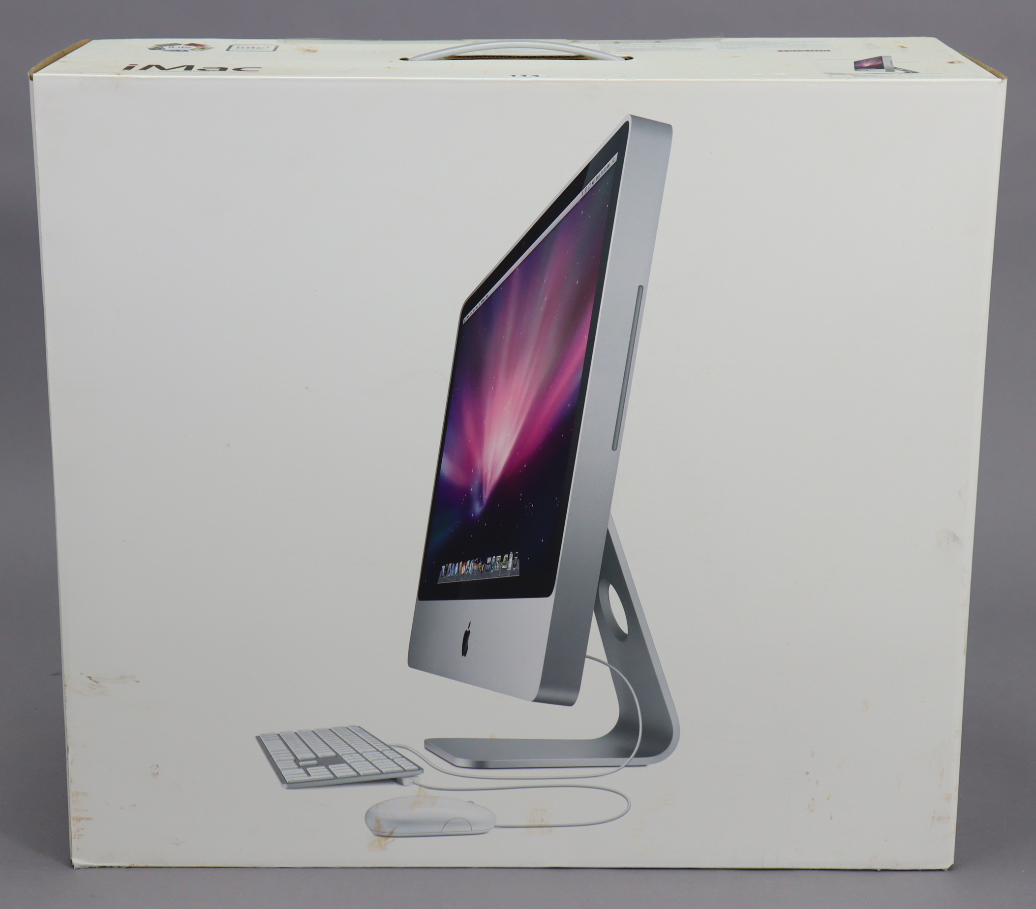 An Apple “Imac” computer, boxed.