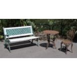 A white & green painted cast-iron & wooden slated garden bench, 49½” long; together with a cast-iron