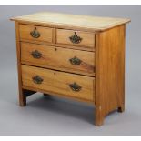 A late Victorian walnut small chest fitted two short & two long graduated drawers with brass swing
