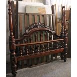 An Anglo-Indian teak four-poster bed with turned spindles to the foot & headboard, 72” wide.