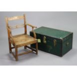 A rail-back cottage elbow chair with a hard seat, & on square tapered legs with plain stretchers;