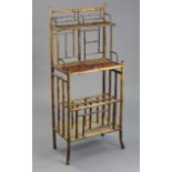 A Victorian painted bamboo & lacquered standing upright magazine rack with two graduated shelves