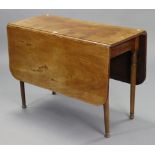 A 19th century mahogany drop-leaf dining table with rounded corners & reeded edge to the