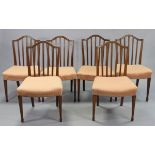 A set of six Georgian-style mahogany rail-back dining chairs with padded seats, & on square