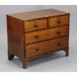 A 19th century mahogany & oak small chest fitted two short & two long graduated drawers with turned
