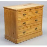 A late Victorian walnut small chest fitted three long graduated drawers with brass swing