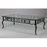 A green-finish wrought-iron low coffee table, with pierced scroll & grapevine frieze, on short