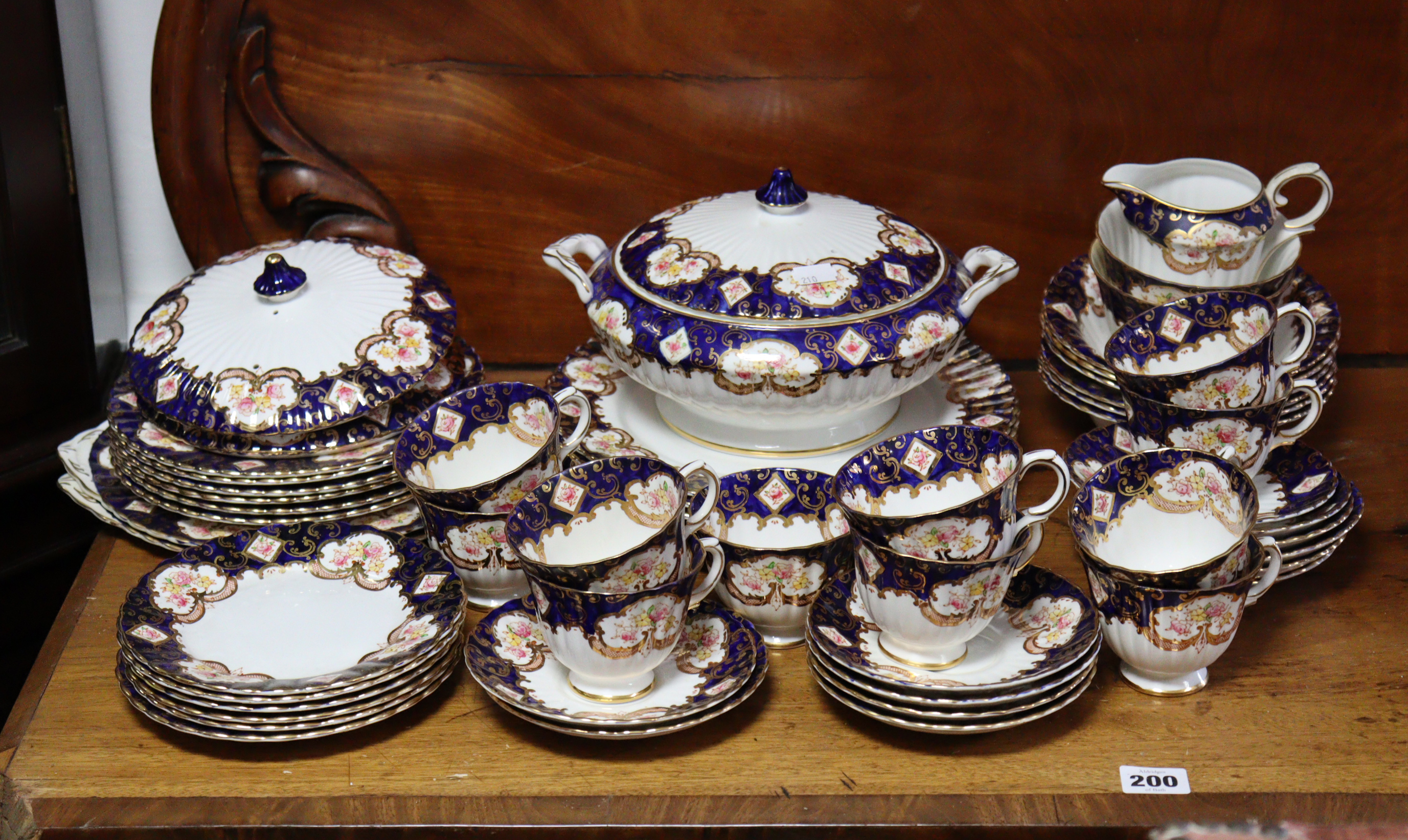 A Royal Stafford bone china “Heritage” fifty-six piece part dinner & tea service; a Japanese