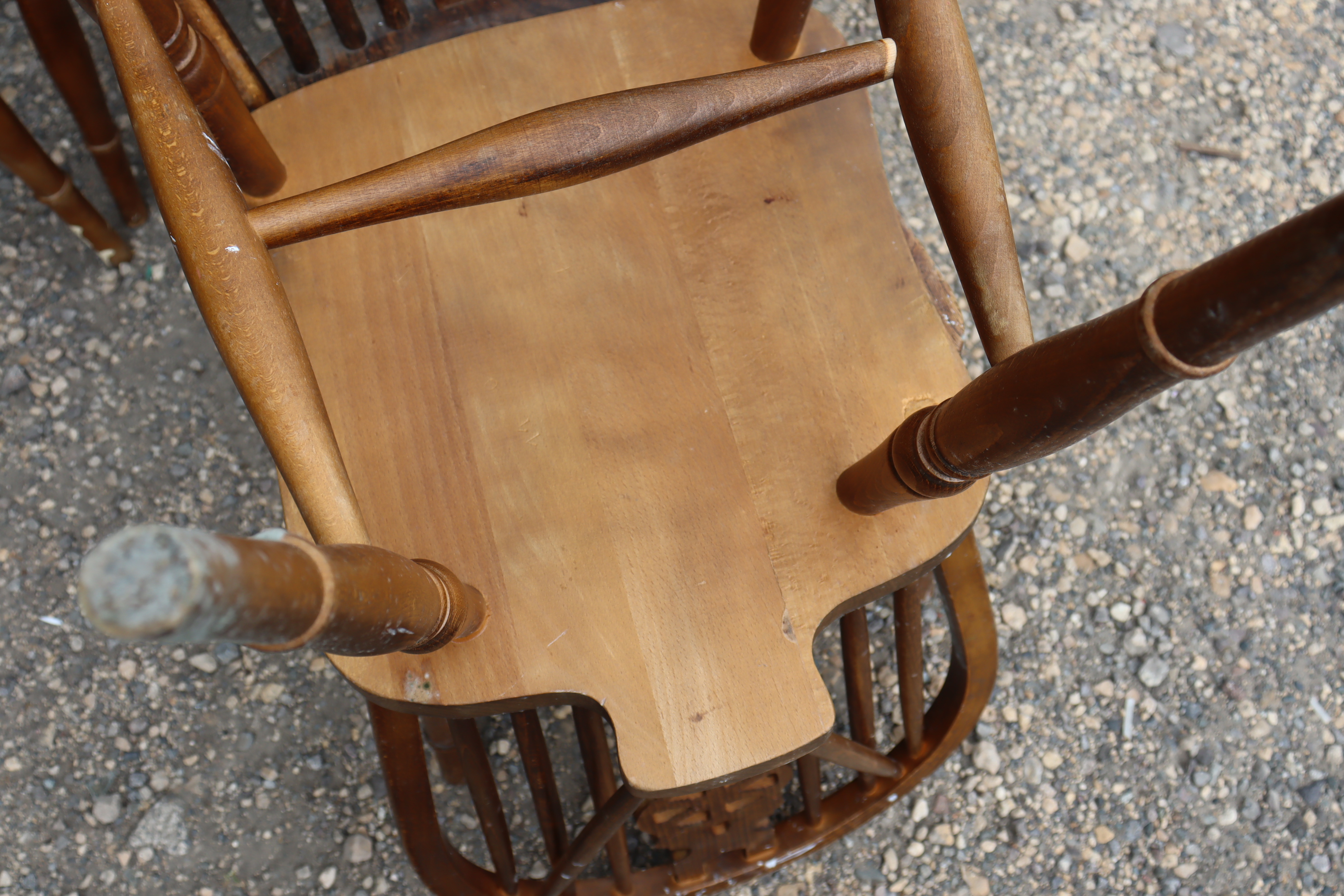 A set of six wheel-back dining chairs with hard seats, & on turned legs with spindle stretchers. - Image 6 of 6