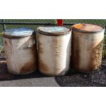 Three mid-20th century American cylindrical storage drums “Alta Quality Dairy Produces, Non Fat
