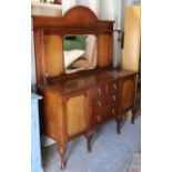 An Edwardian mahogany mirror-back sideboard inset bevelled rectangular plate, fitted two short & two