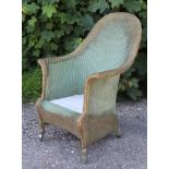 A Lusty’s Lloyd loom green & gold painted easy chair