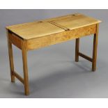 A pine “duet” school desk on square legs with plain stretchers, 39½” wide x 26” high.