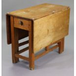 A pine drop-leaf kitchen table fitted one drawer, & on square legs with plain stretchers, 35½”