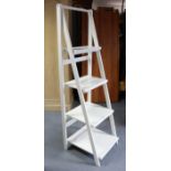 A contemporary white-finish tall standing four-tier open bookcase on square supports, 19¾” wide x