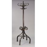 An early/mid-20th century Mundus bentwood hat & coat stand, 79½” high.