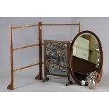 An Edwardian inlaid mahogany frame oval wall mirror inset bevelled plate, 20½” x 32”; together