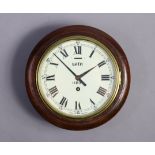 A vintage station (?) clock with black roman numerals to the 7¼” diameter white enamel dial