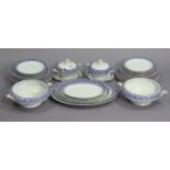 A Luxor forty-five piece part dinner service of white ground with blue geometric design.
