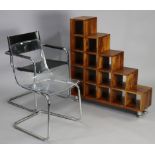 A teak aesthetic style small standing bookcase with fifteen divisions, 35½” wide x 38½” high;