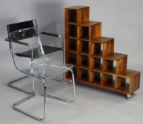 A teak aesthetic style small standing bookcase with fifteen divisions, 35½” wide x 38½” high;