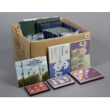 A collection of British coins in 16 Whitman folders (some complete); various British proof sets, un-