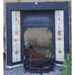 An Edwardian cast-iron fire-insert inset tiles to border, 37¾” wide x 37¾” high.