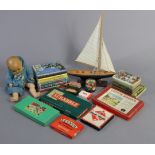 A Lott’s Bricks construction set (set No. 1), boxed; a model pond yacht; a German composition baby