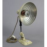 A vintage Pifco “Infa-Red and Radiant Heat” desk lamp.