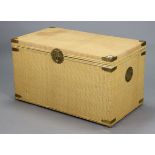 A Chinese style woven-cane covered wooden blanket box with hinge lift-lid, brass mounts, & brass