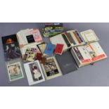 A collection of bookmarks in two albums; together with various programmes & catalogues; three jigsaw