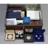A GOOD COLLECTION OF CASED PROOF COINS, including Royal Mint silver proof four-coin £1 set, 1984-7;